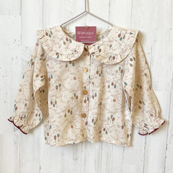 Blusa estampada cuello con volante